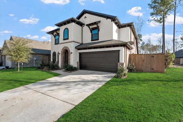 view of front of property with a garage and a front lawn