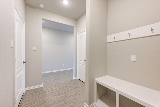 mudroom with light wood-type flooring