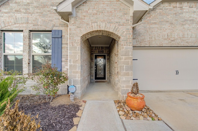 entrance to property featuring a garage