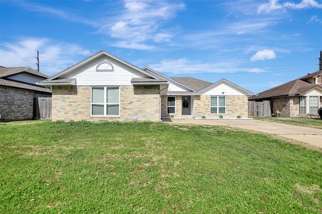 ranch-style home with a front lawn