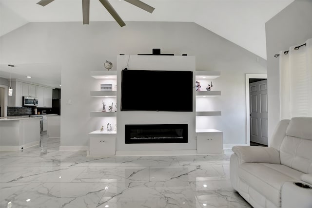 living room with high vaulted ceiling and ceiling fan