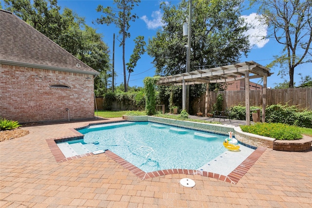 view of swimming pool featuring a pergola and a patio