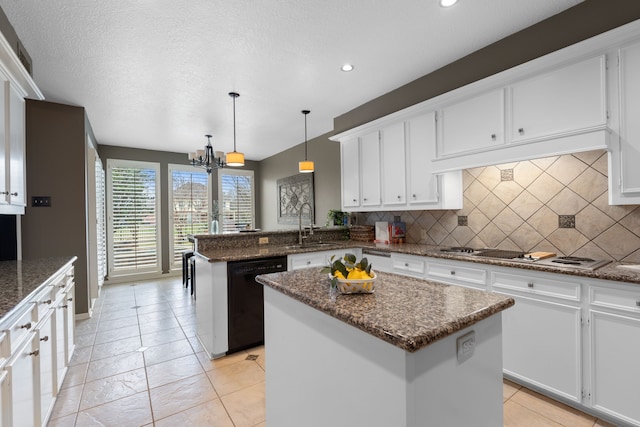 kitchen featuring gas cooktop, hanging light fixtures, a center island, black dishwasher, and kitchen peninsula