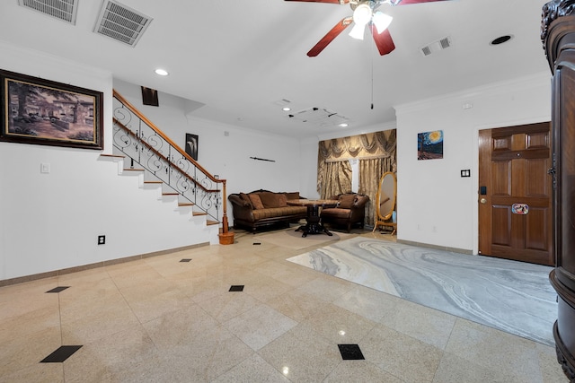 unfurnished living room with crown molding and ceiling fan