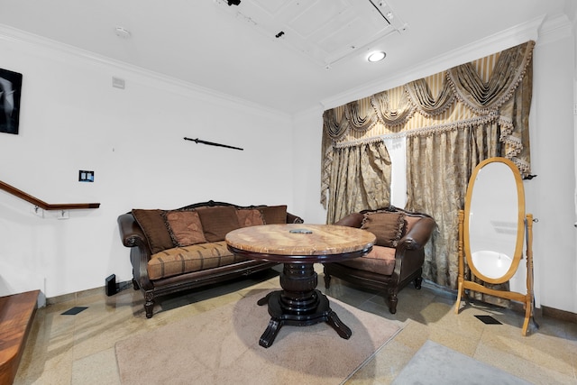 living area with ornamental molding