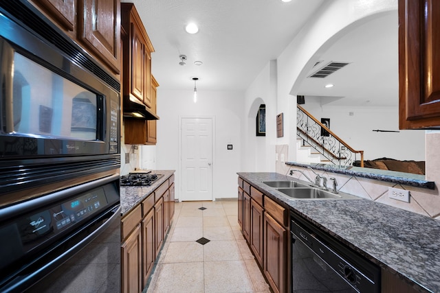 kitchen featuring sink and black appliances