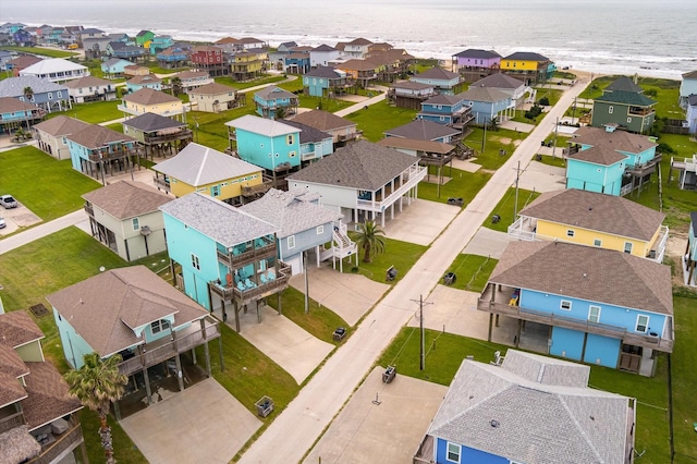 aerial view featuring a water view and a residential view