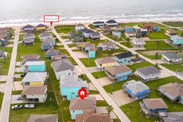 bird's eye view with a residential view and a water view