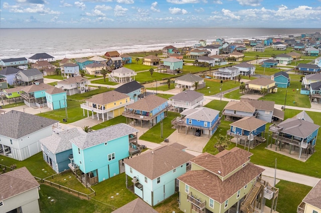 bird's eye view with a residential view and a water view