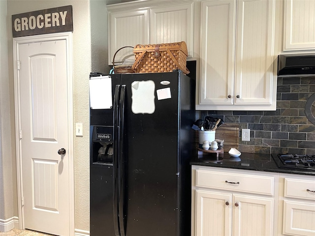 kitchen with decorative backsplash and black appliances