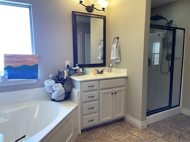 bathroom featuring vanity and separate shower and tub