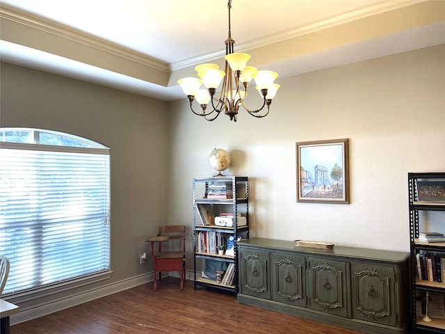 interior space with ornamental molding, dark hardwood / wood-style flooring, and a chandelier