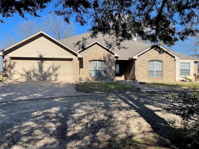 single story home featuring a garage