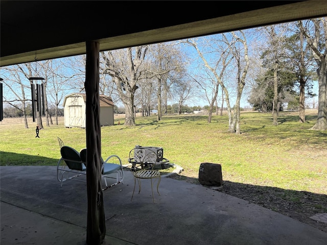 view of patio with a storage shed