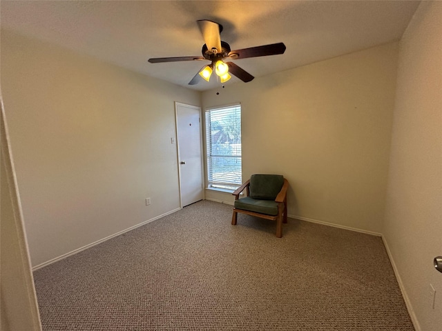 unfurnished room with carpet flooring and ceiling fan