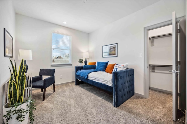 bedroom featuring light carpet