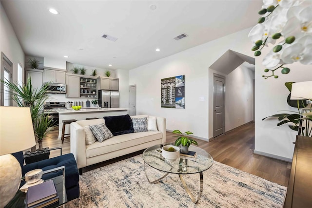 living room with wood-type flooring