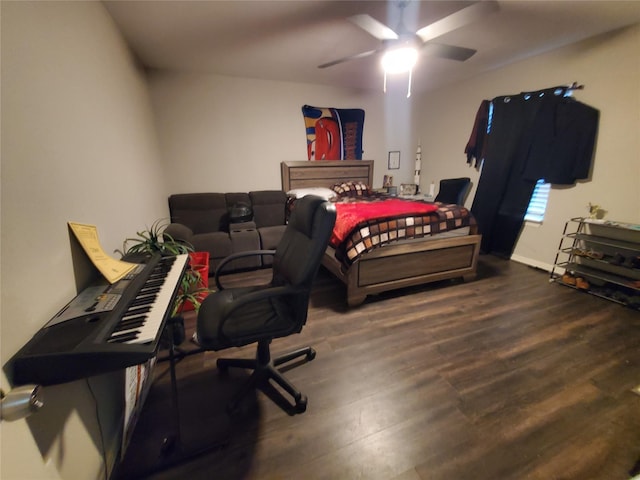 bedroom featuring ceiling fan and dark hardwood / wood-style flooring