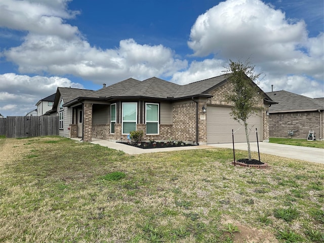 view of front facade with a garage and a front yard