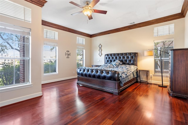 bedroom with hardwood / wood-style flooring, ceiling fan, and crown molding