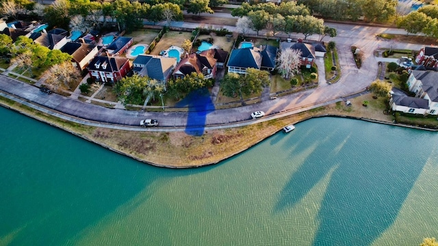 drone / aerial view featuring a water view