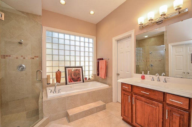 bathroom with vanity, separate shower and tub, and tile patterned floors