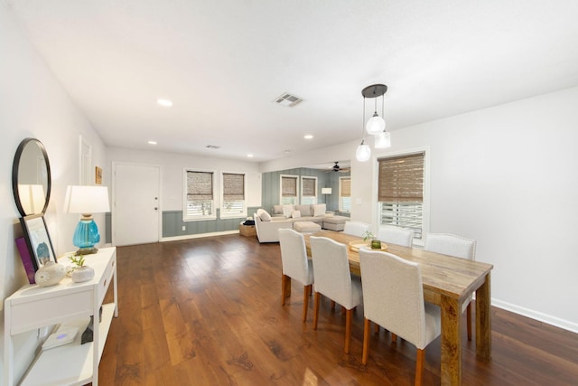 dining room featuring dark wood-type flooring