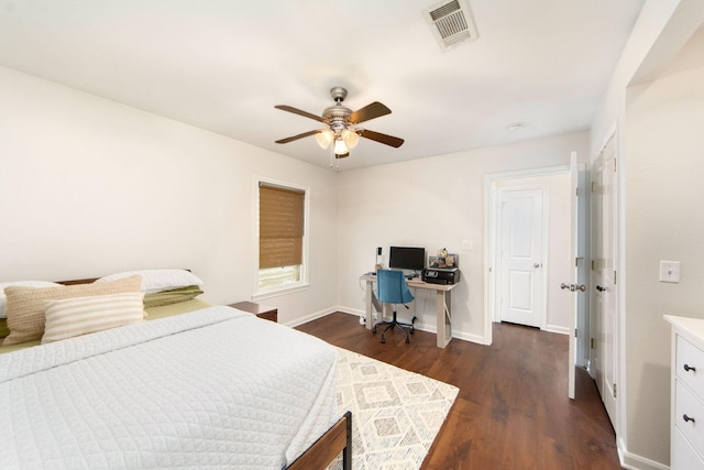 bedroom featuring ceiling fan and dark hardwood / wood-style floors