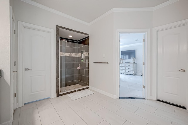 bathroom featuring crown molding and a shower with shower door