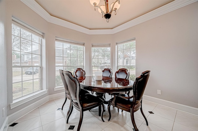 tiled dining space with ornamental molding and a chandelier