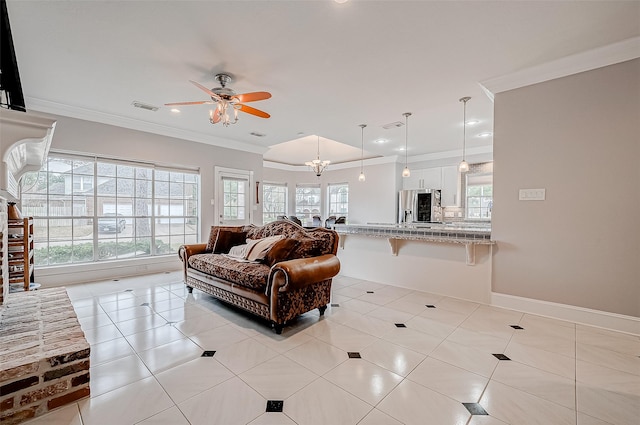 tiled living room featuring ornamental molding and ceiling fan