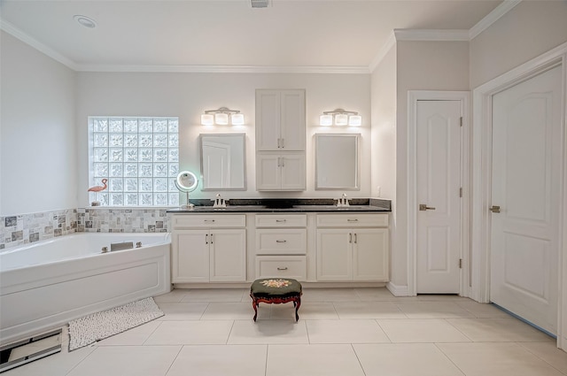 bathroom featuring ornamental molding, vanity, tile patterned floors, and a washtub