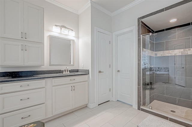 bathroom with crown molding, vanity, tile patterned floors, and a shower with shower door