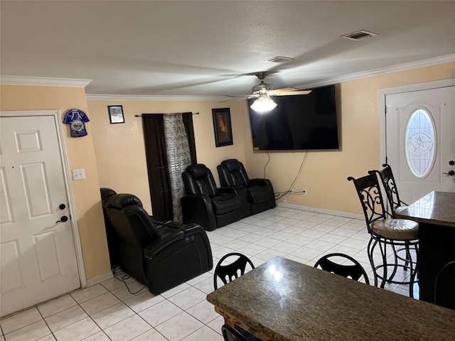 tiled living room featuring crown molding and ceiling fan