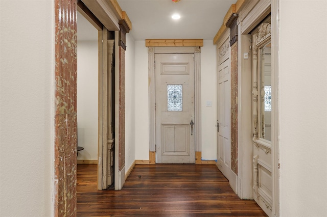 corridor featuring dark wood-type flooring