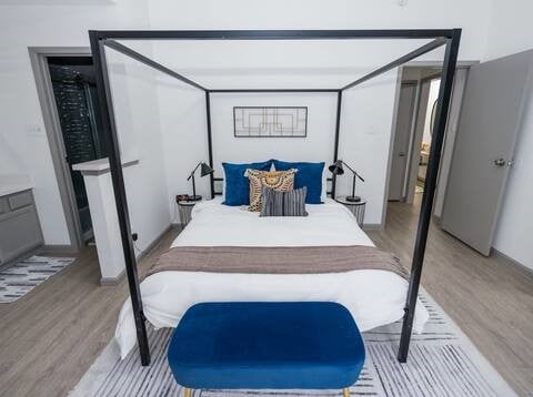 bedroom featuring light wood-type flooring