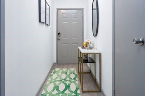 entryway with light hardwood / wood-style flooring