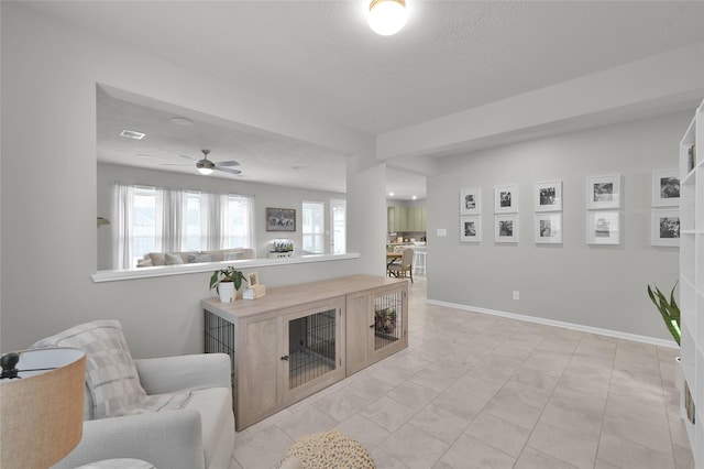 living room featuring plenty of natural light