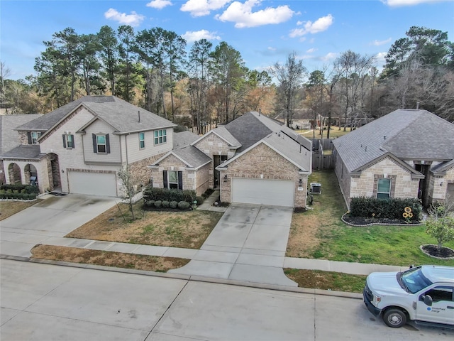 front of property with a garage and a front yard