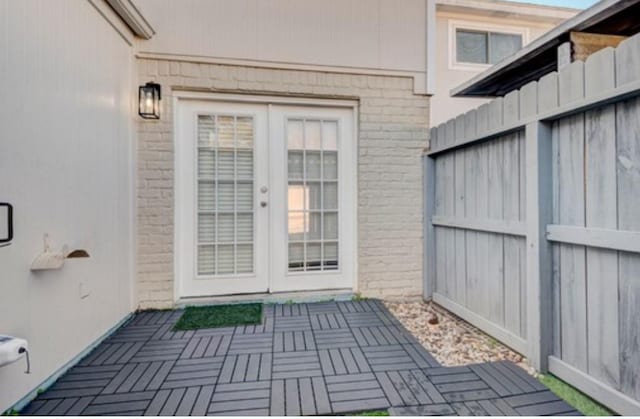 entrance to property with a patio