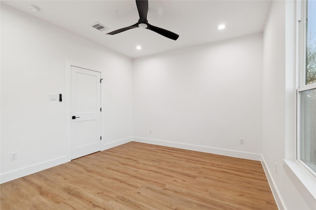 unfurnished room with light hardwood / wood-style floors and ceiling fan