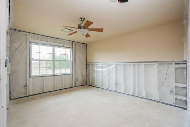 spare room with ceiling fan