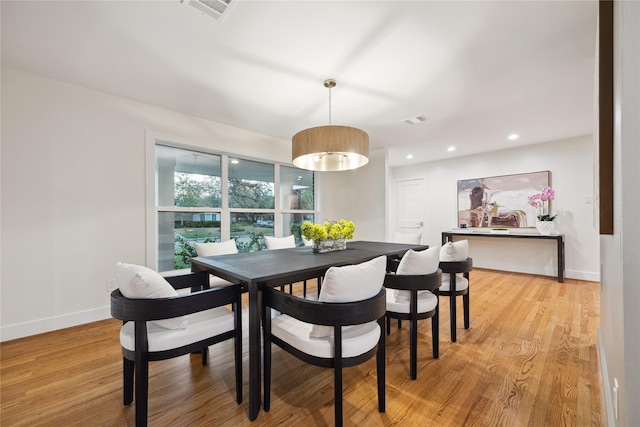 dining room with light hardwood / wood-style flooring