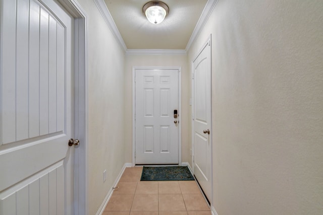 doorway featuring light tile patterned flooring and ornamental molding