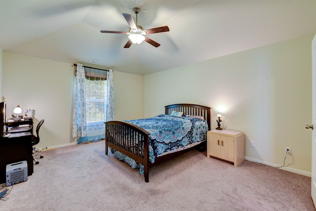 carpeted bedroom with lofted ceiling and ceiling fan