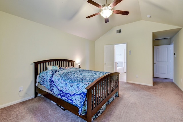 carpeted bedroom with vaulted ceiling and ceiling fan