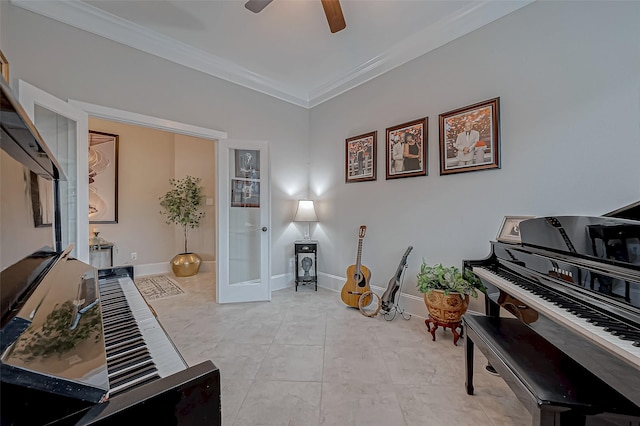 living area featuring ornamental molding, ceiling fan, baseboards, and light tile patterned floors