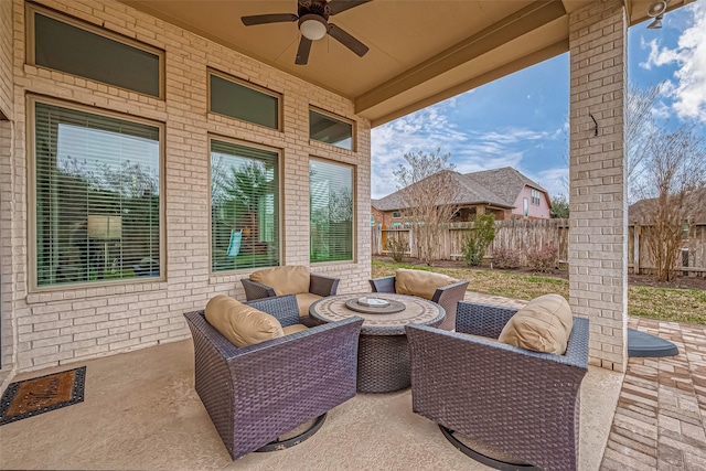 view of patio featuring ceiling fan and a fenced backyard