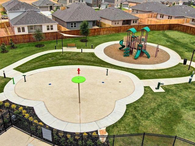 surrounding community with a lawn and a playground