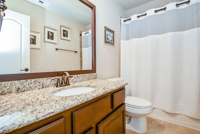 full bathroom with visible vents, toilet, shower / tub combo, tile patterned flooring, and vanity